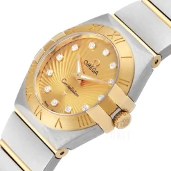 Constellation Quartz 24mm Champagnefärgad/18 karat gult guld Ø24 mm